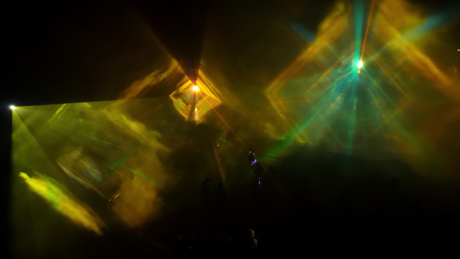 Projectors lighting the water and mist screens of Depth/100 at Ozora