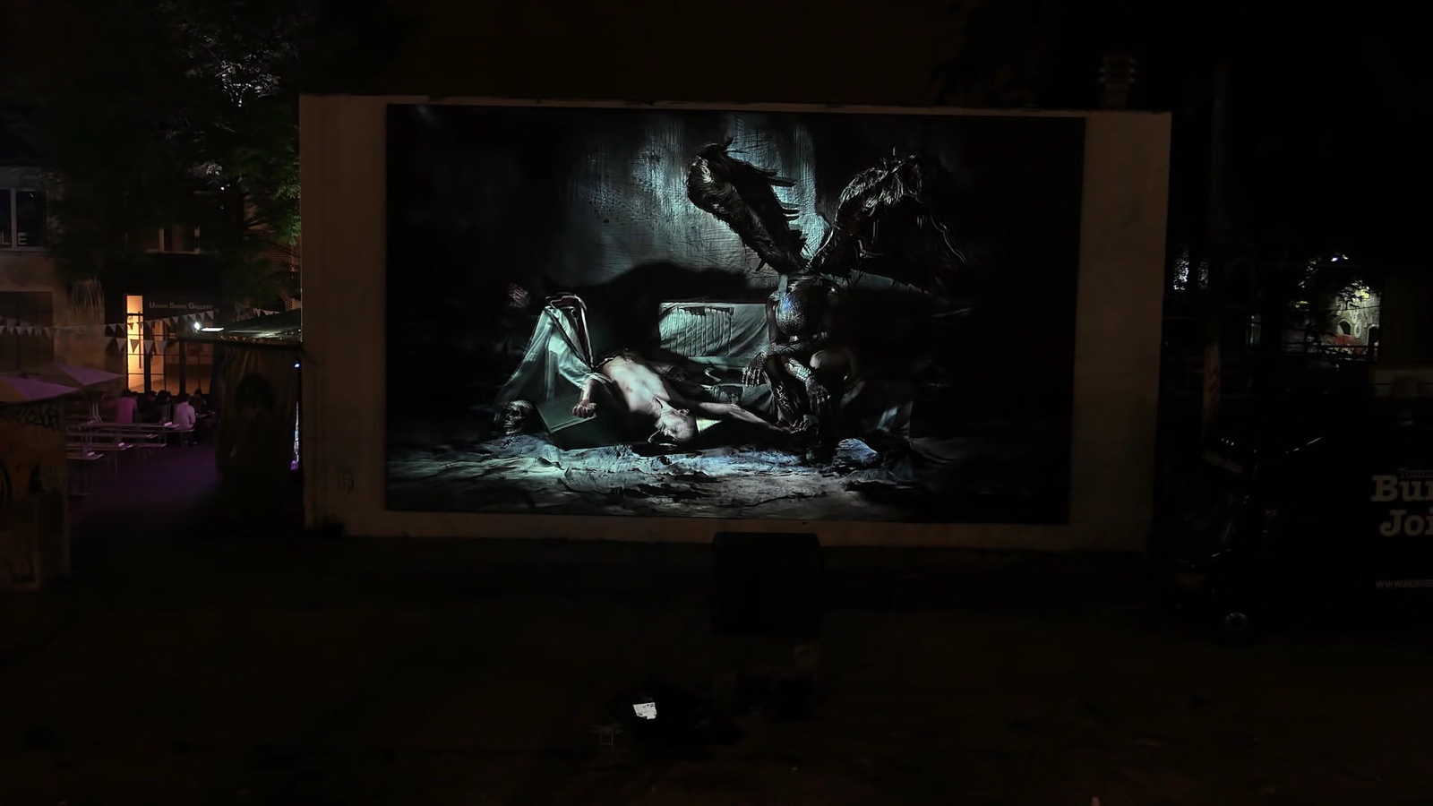 Gérard Rancinan’s large-format photograph ‘The Party Is Over’ animated by projection mapping at Urban Spree Gallery Berlin